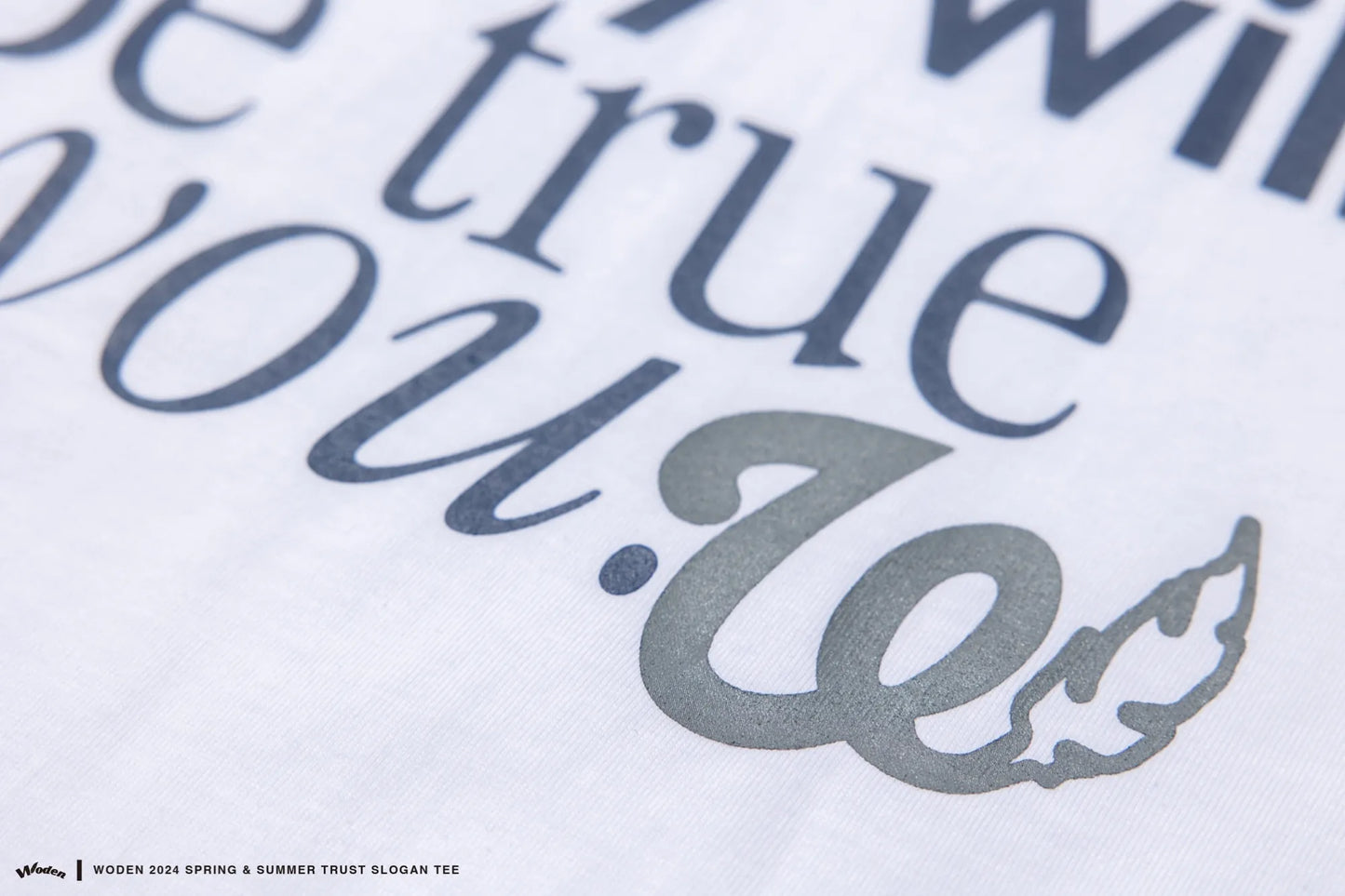 WODEN 2024 SPRING & SUMMER TRUST SLOGAN TEE