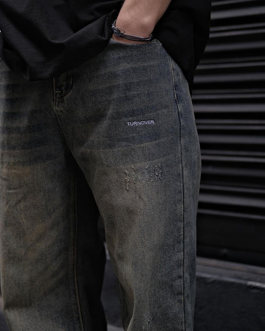 TURNOVER WASHED BAGGY JEANS