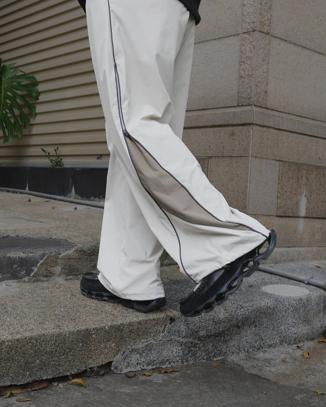 QUEST PIPING TRACK PANTS拼接拉鏈寬褲